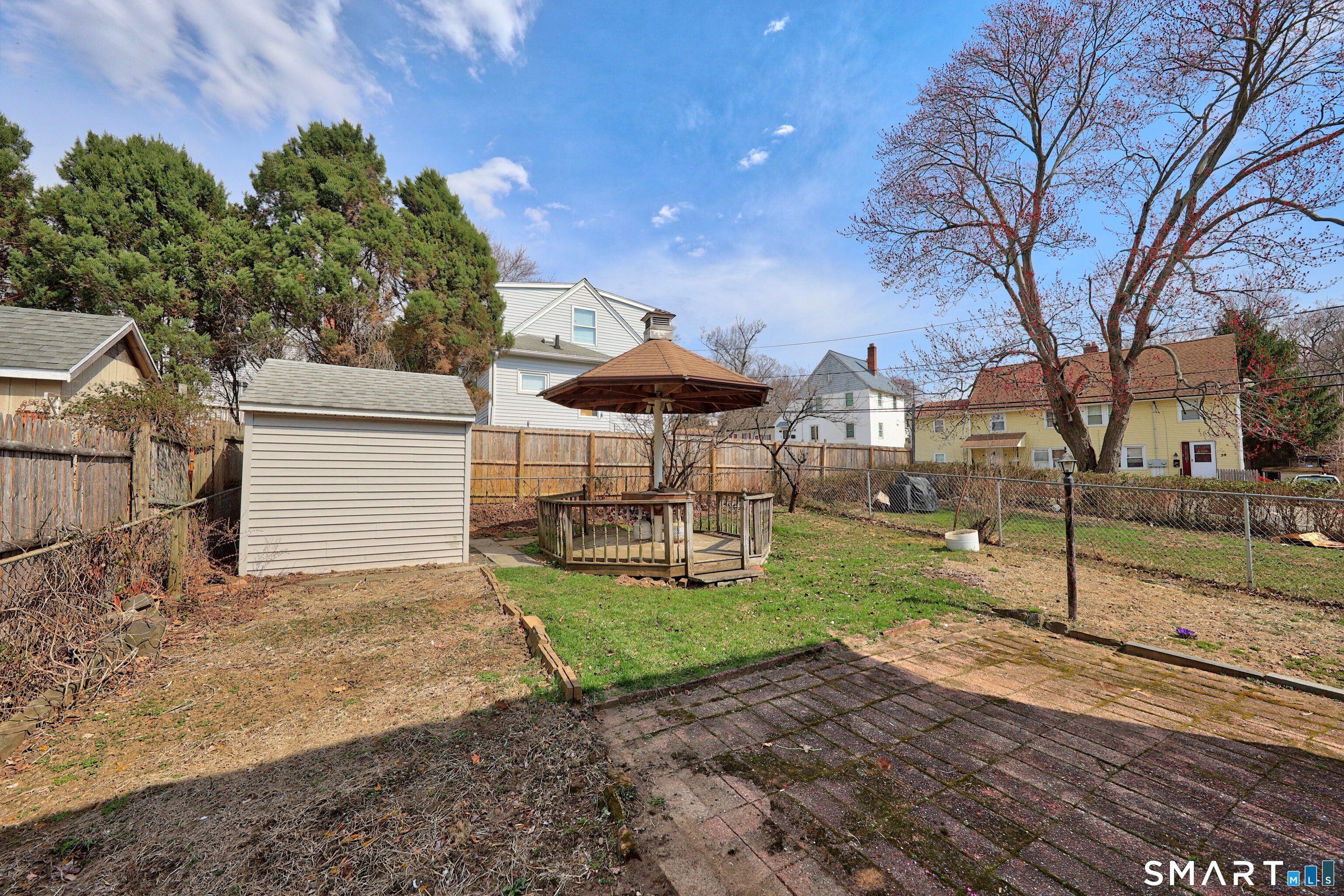 33 West View Street Waterbury, CT 06706 - Photo 27 of 29 a view of a house with backyard and a tree