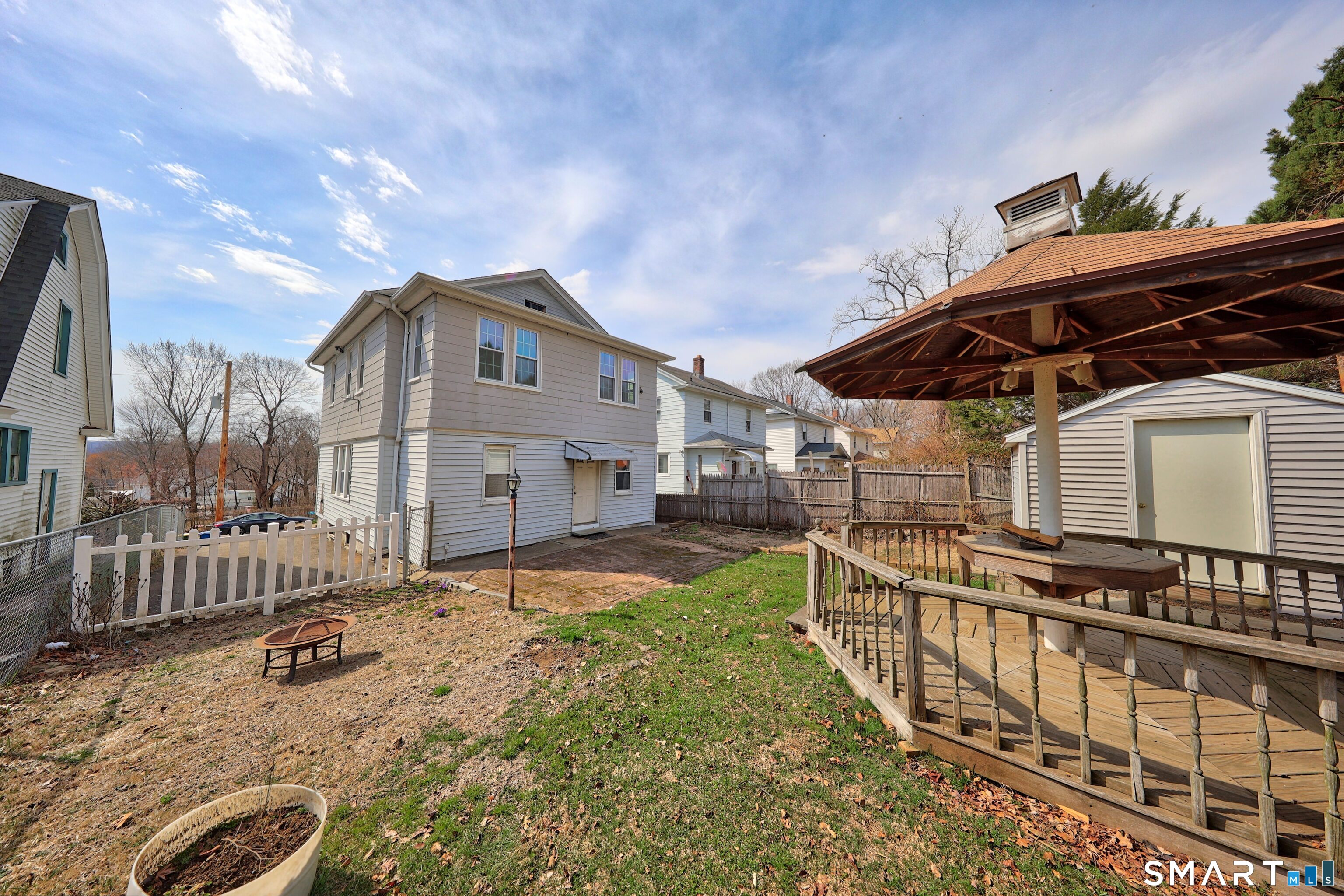 33 West View Street Waterbury, CT 06706 - Photo 29 of 29 a view of a house with a wooden fence