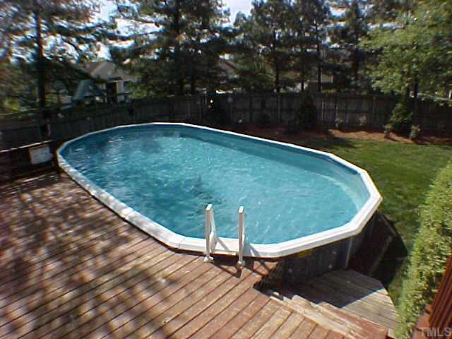 2320 Declaration Drive Raleigh, NC 27615 - Photo 9 of 10 a view of a swimming pool with a yard