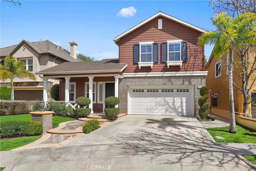 4 Sutherland Drive Ladera Ranch, CA 92694 - Photo 1 of 28 a front view of a house with a yard and potted plants