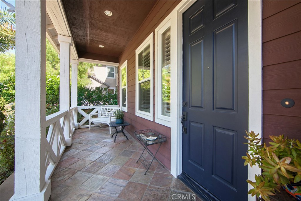 4 Sutherland Drive Ladera Ranch, CA 92694 - Photo 2 of 28 a view of a porch with chairs and backyard