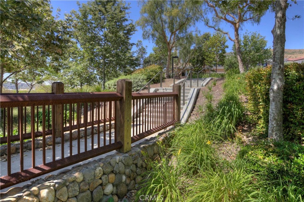4 Sutherland Drive Ladera Ranch, CA 92694 - Photo 24 of 28 a view of a balcony with wooden fence
