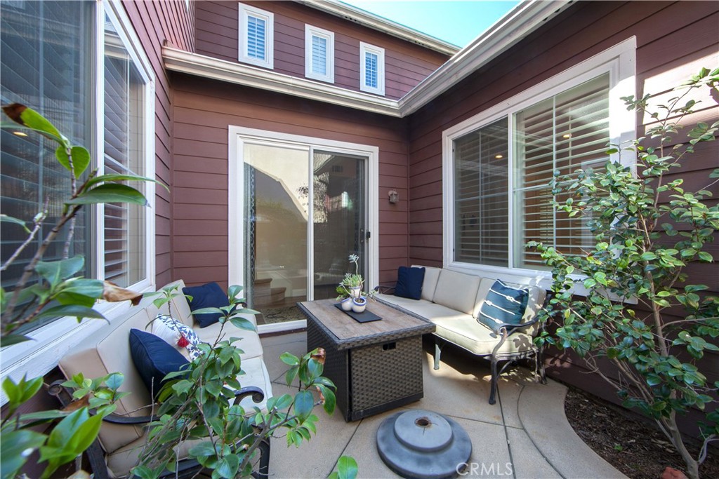 4 Sutherland Drive Ladera Ranch, CA 92694 - Photo 6 of 28 a outdoor living space with furniture and potted plants