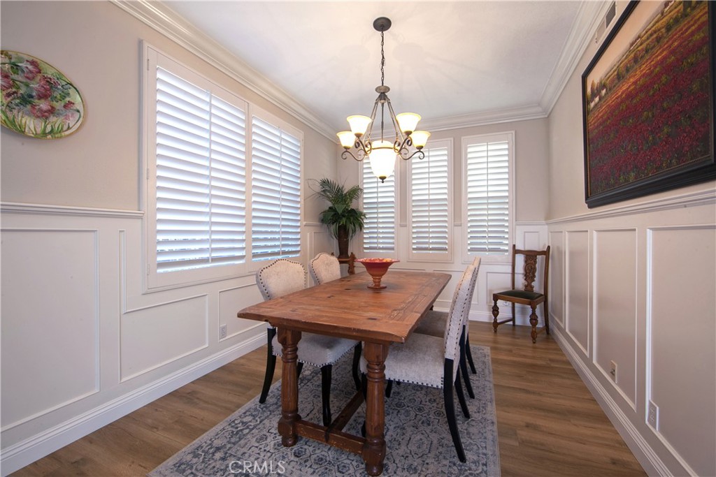 4 Sutherland Drive Ladera Ranch, CA 92694 - Photo 7 of 28 a view of a dining room with furniture window and wooden floor
