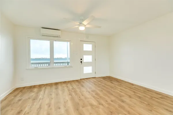 a view of an empty room and window