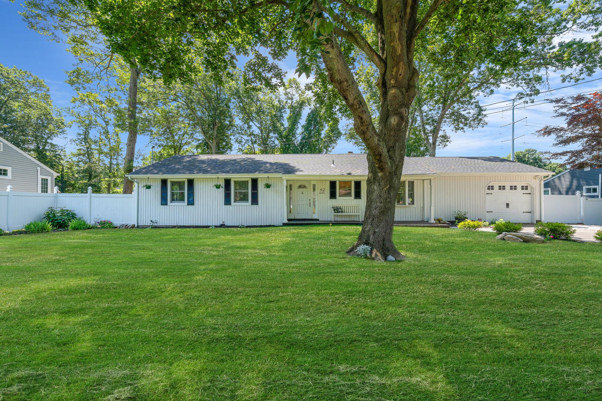62 Mahogany Road Rocky Point, NY 11778 - Photo 1 of 1 a view of a house with a yard
