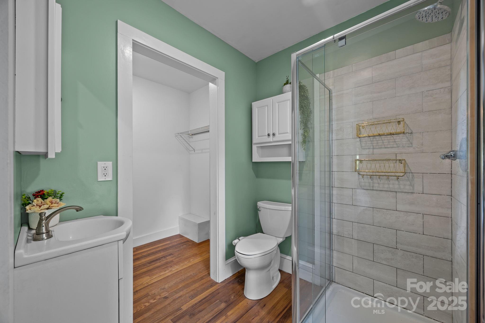 300 Gap Creek Road Fletcher, NC 28732 - Photo 28 of 48 a bathroom with a toilet and a shower