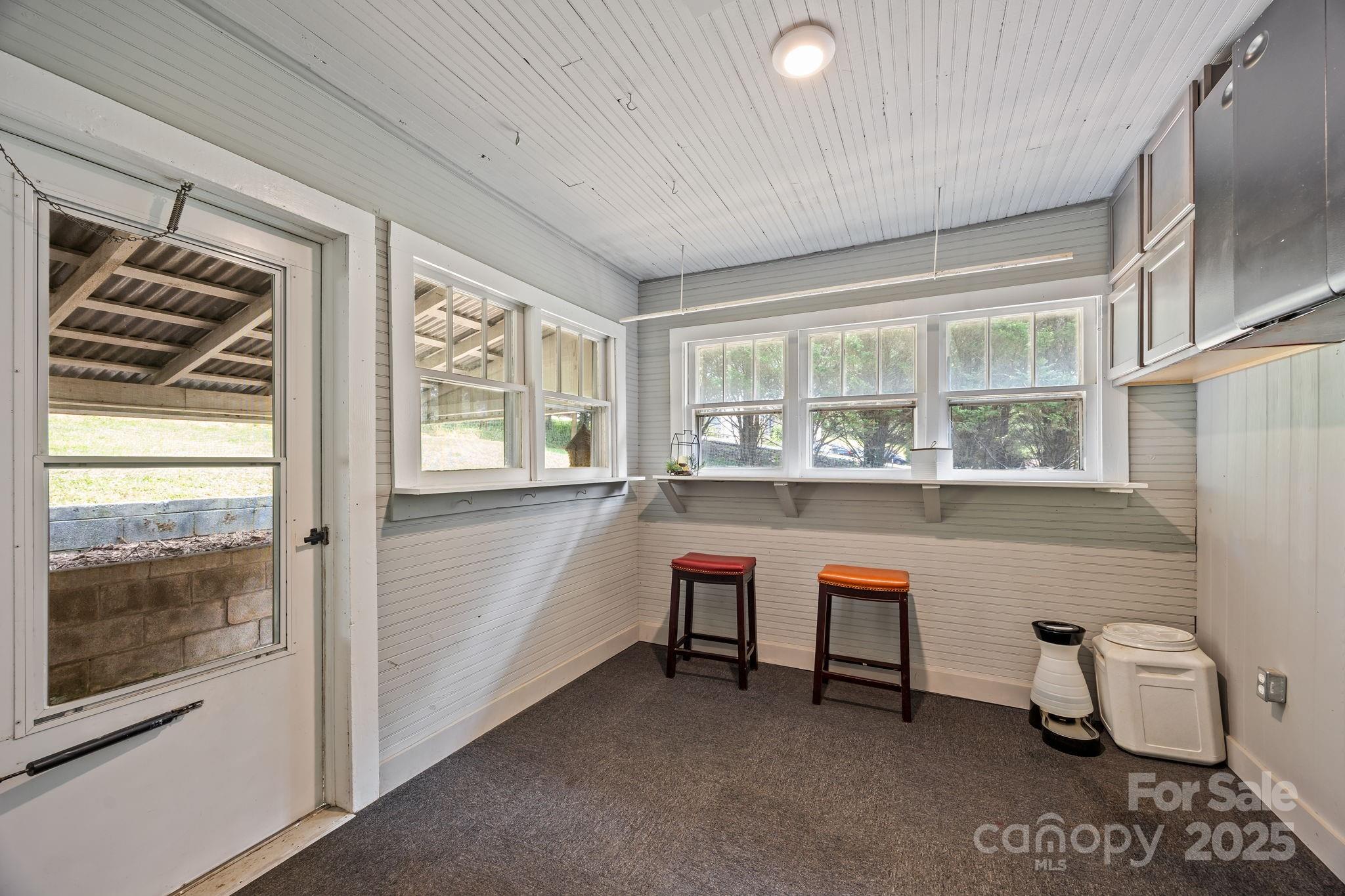 300 Gap Creek Road Fletcher, NC 28732 - Photo 30 of 48 a room with furniture and a window