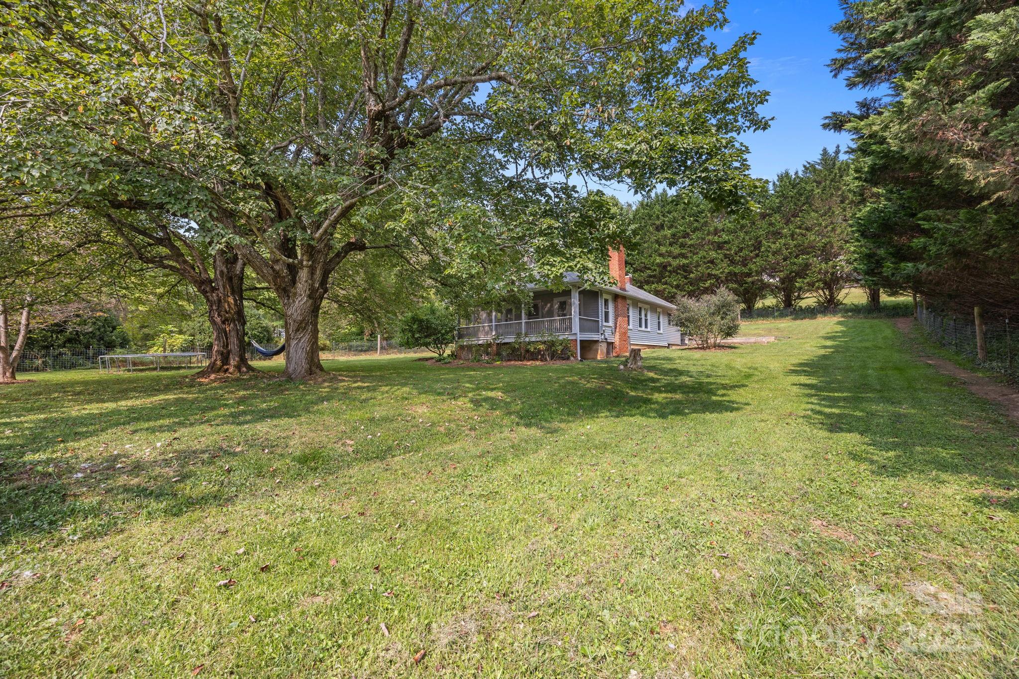 300 Gap Creek Road Fletcher, NC 28732 - Photo 3 of 48 a house view with swimming pool