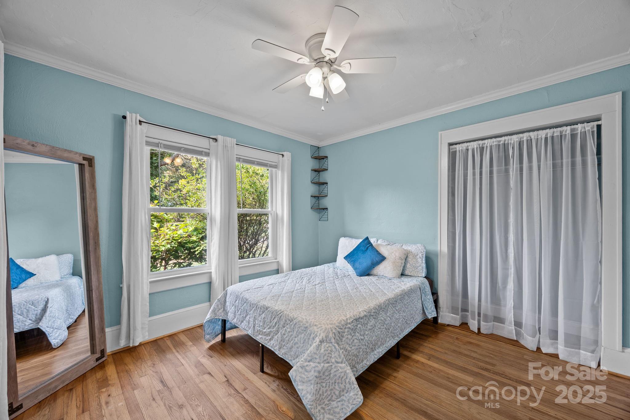 300 Gap Creek Road Fletcher, NC 28732 - Photo 35 of 48 a bedroom with a bed and a window