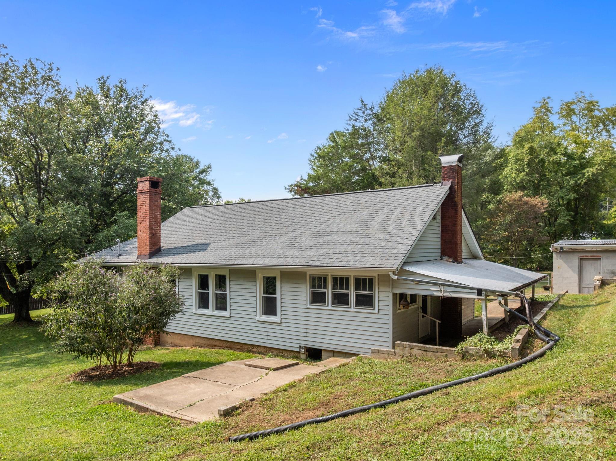 300 Gap Creek Road Fletcher, NC 28732 - Photo 38 of 48 a aerial view of a house with yard porch and furniture