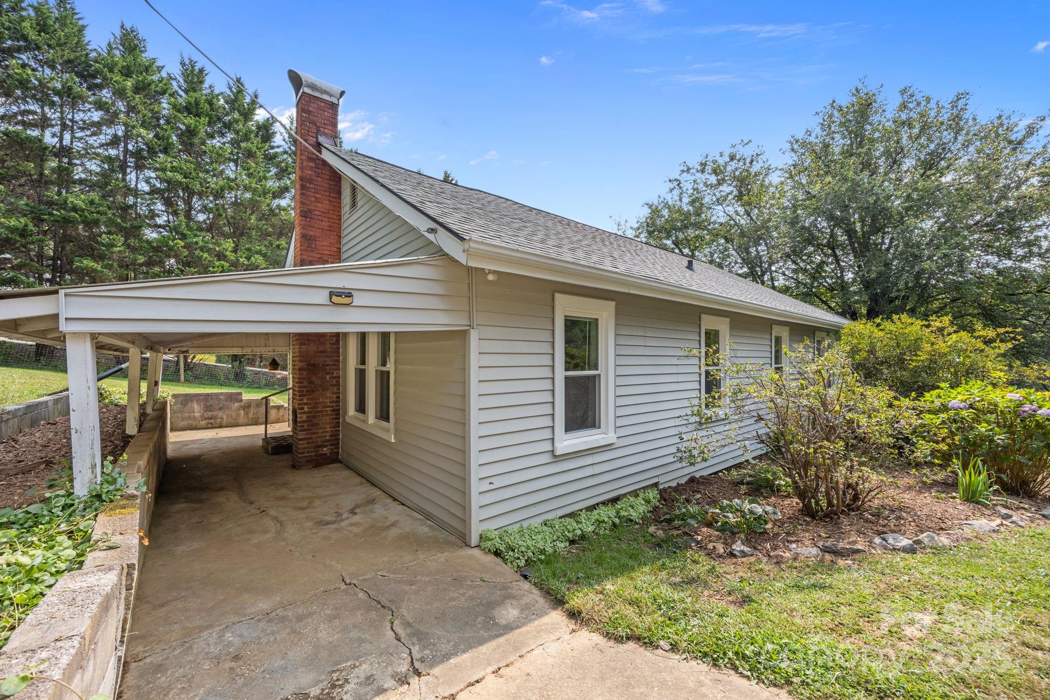 300 Gap Creek Road Fletcher, NC 28732 - Photo 40 of 48 a view of a house with a patio