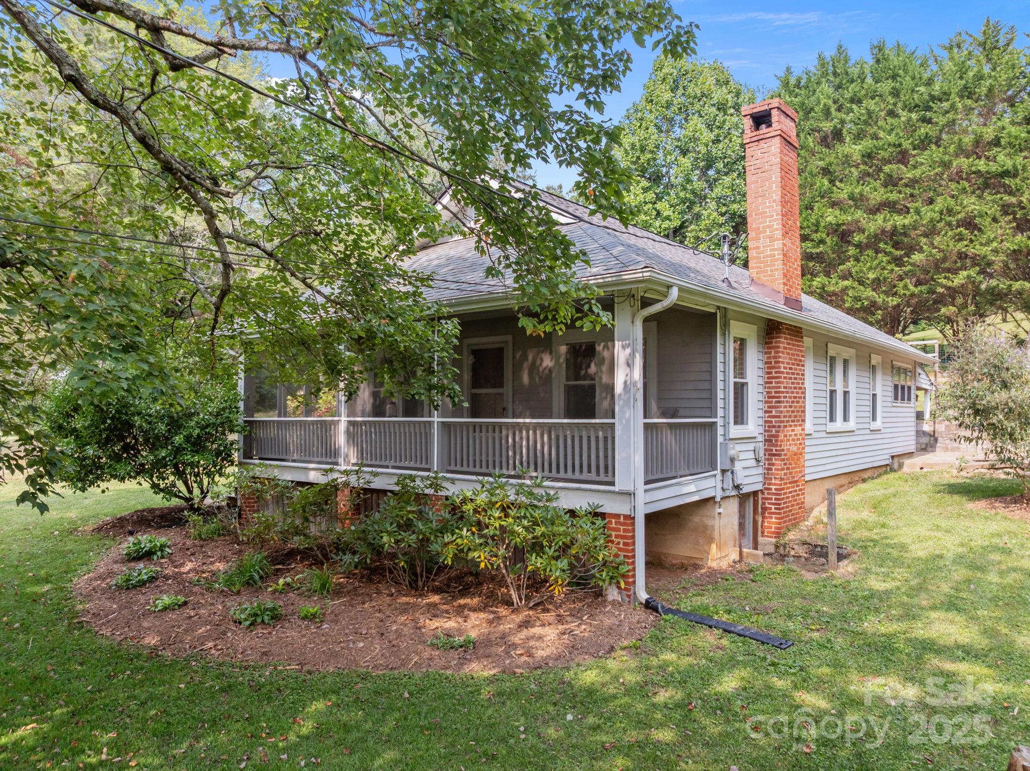 300 Gap Creek Road Fletcher, NC 28732 - Photo 42 of 48 a view of a wooden house with a yard