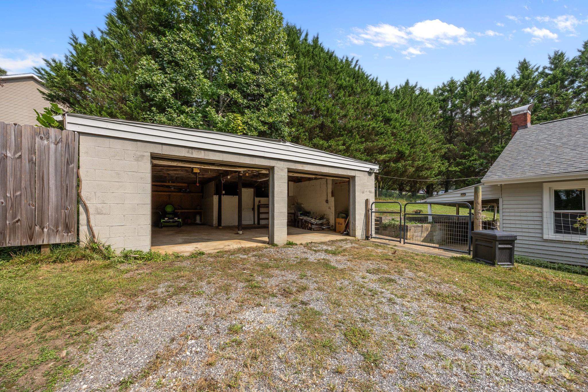 300 Gap Creek Road Fletcher, NC 28732 - Photo 43 of 48 a view of a house with a yard and sitting area