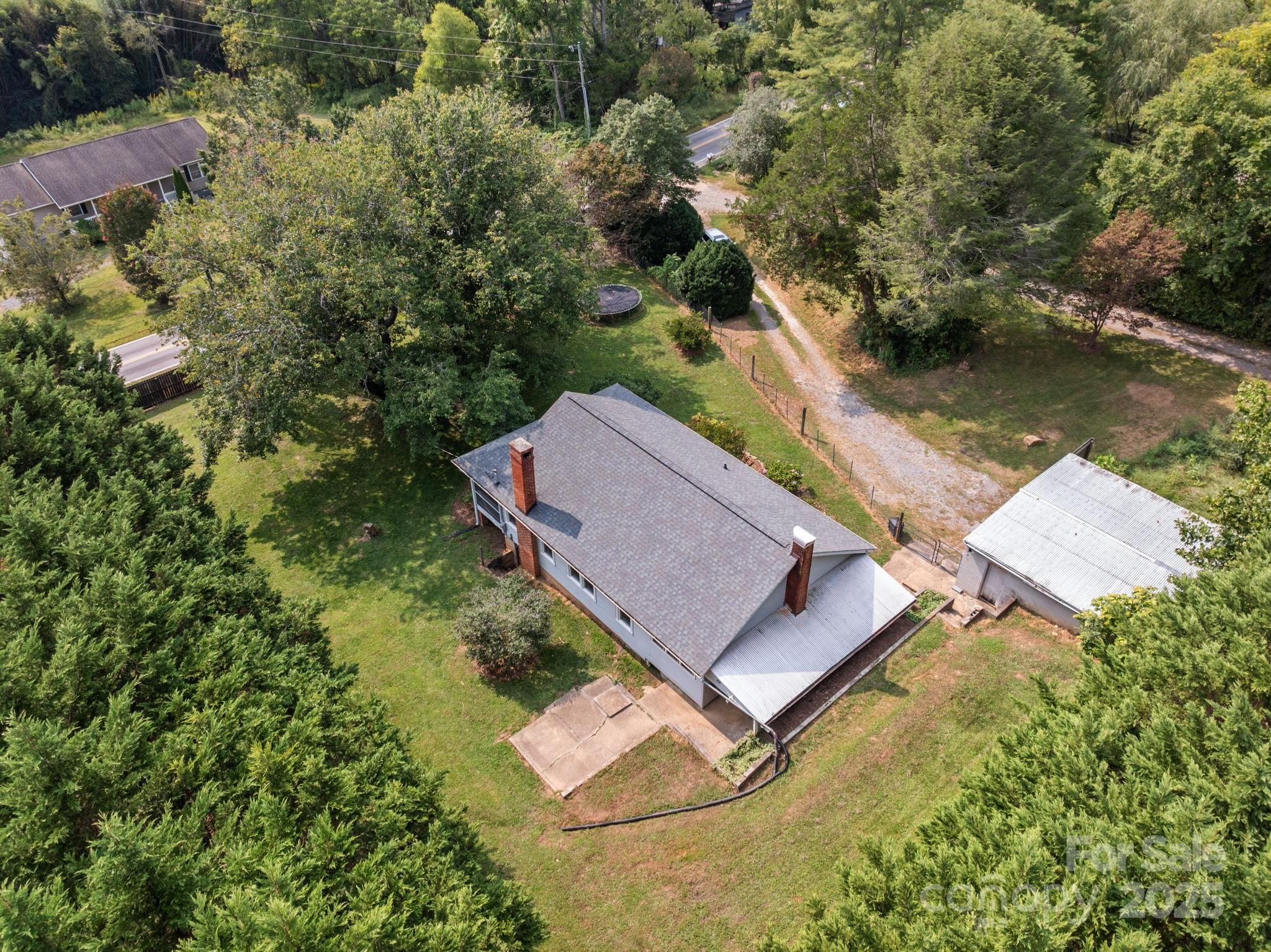 300 Gap Creek Road Fletcher, NC 28732 - Photo 47 of 48 an aerial view of a house with a yard