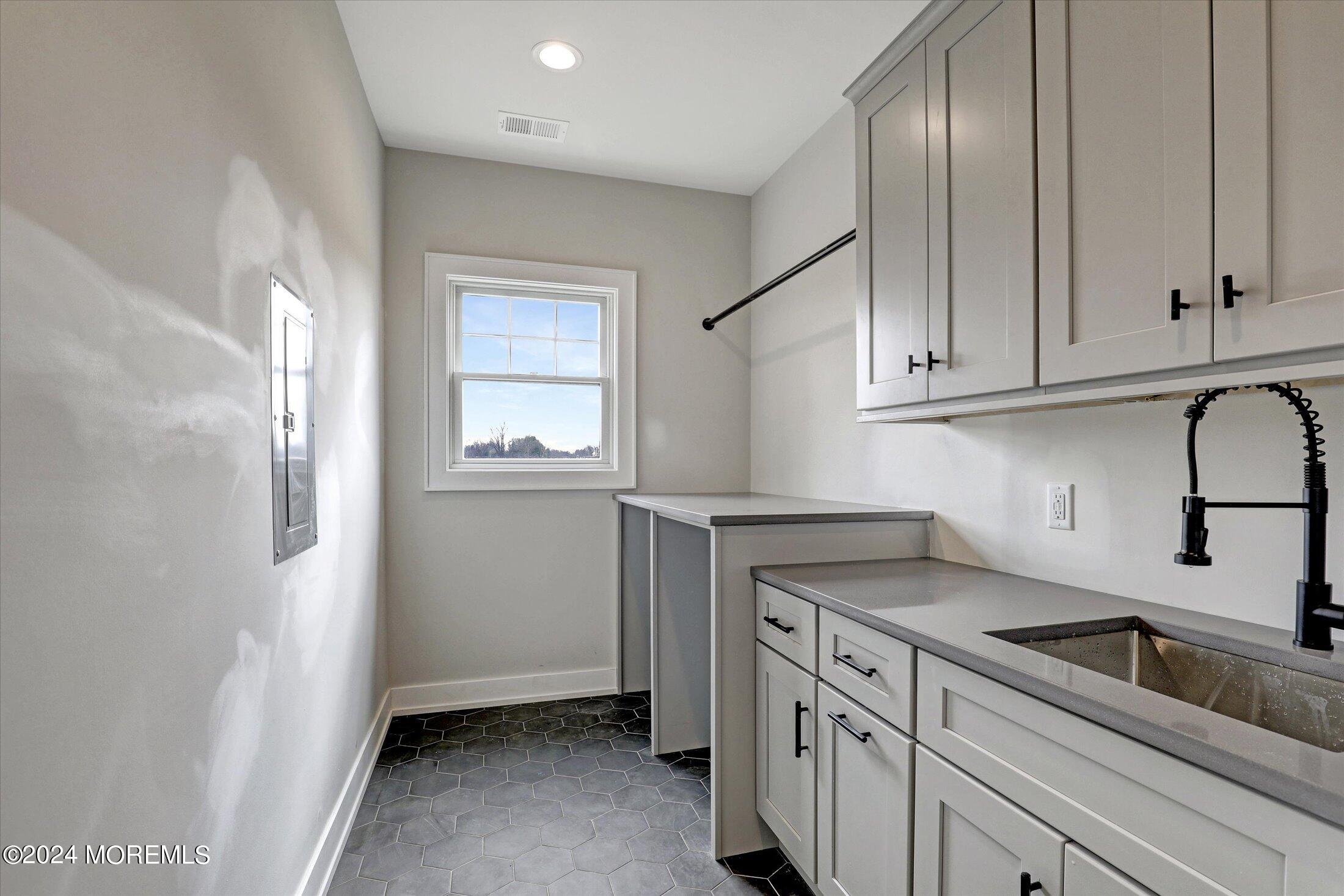 60 Middletown Road Holmdel, NJ 07733 - Photo 65 of 67 38-Laundry