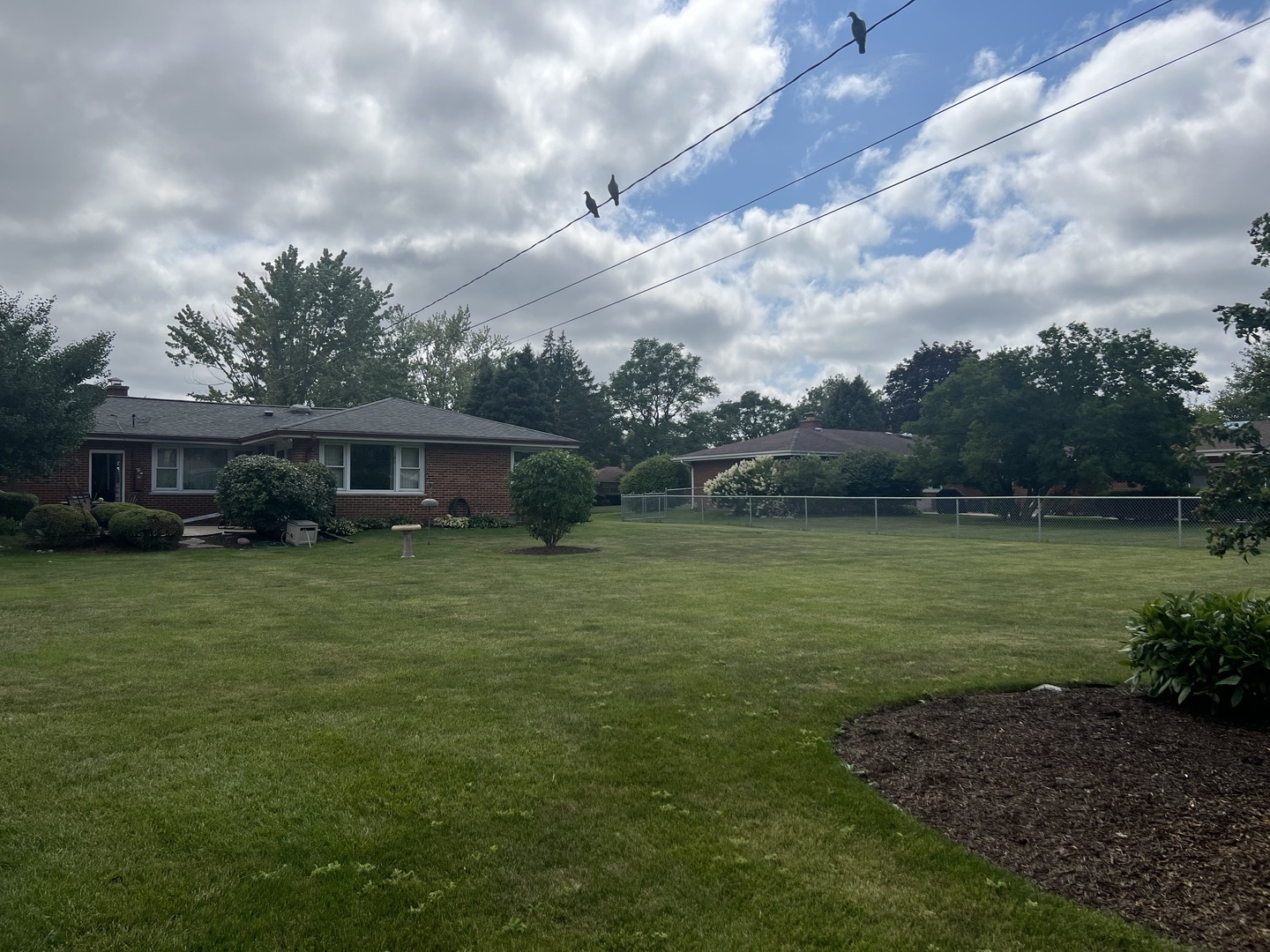 14 Drake Terrace Prospect Heights, IL 60070 - Photo 6 of 7 a front view of a house with a garden