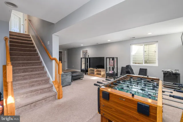 a bedroom with a bed and a cabinets