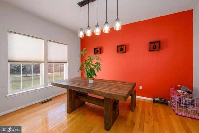 a workspace with furniture and window