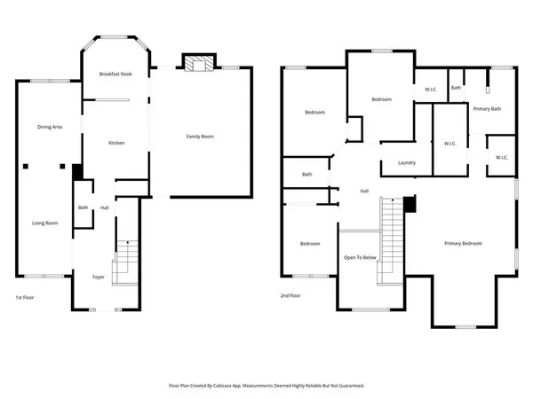 a view of staircase with wooden floor and white walls