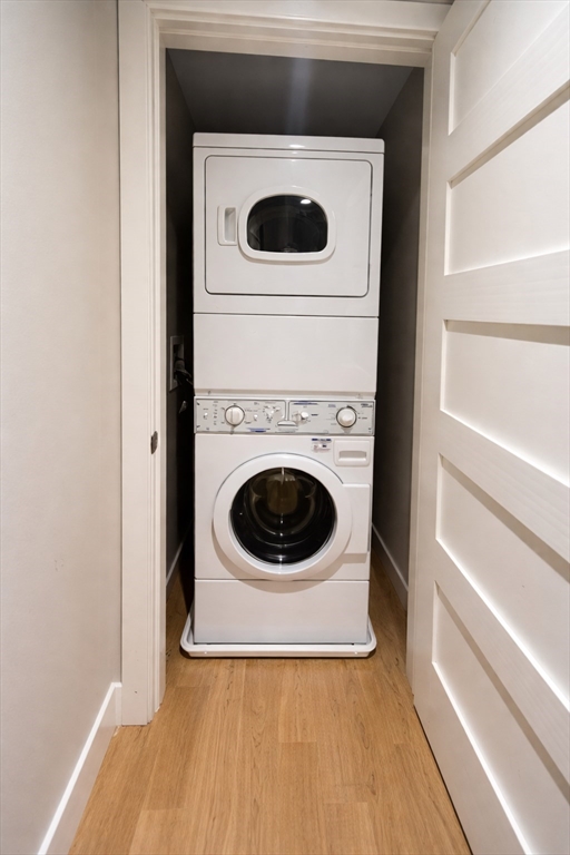 130 John Street, Unit 142 Lowell, MA 01852 - Photo 8 of 15 a utility room with dryer and washer