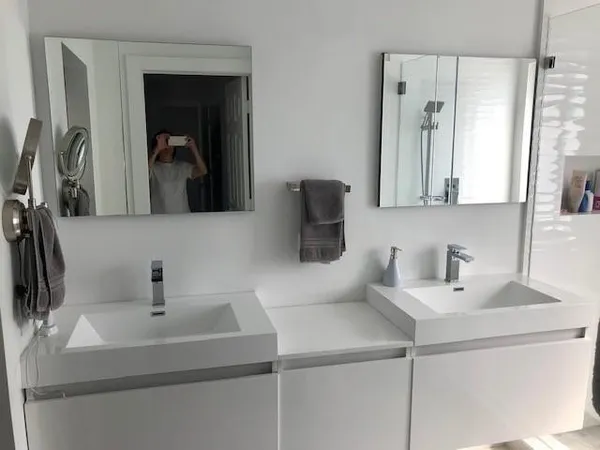 a bathroom with a sink and a mirror
