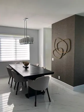 a workspace with furniture and window