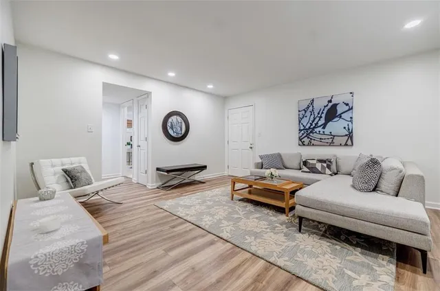 a bedroom with a bed and glass window