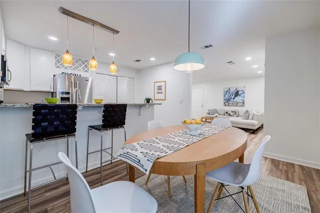 a view of a dining room with furniture