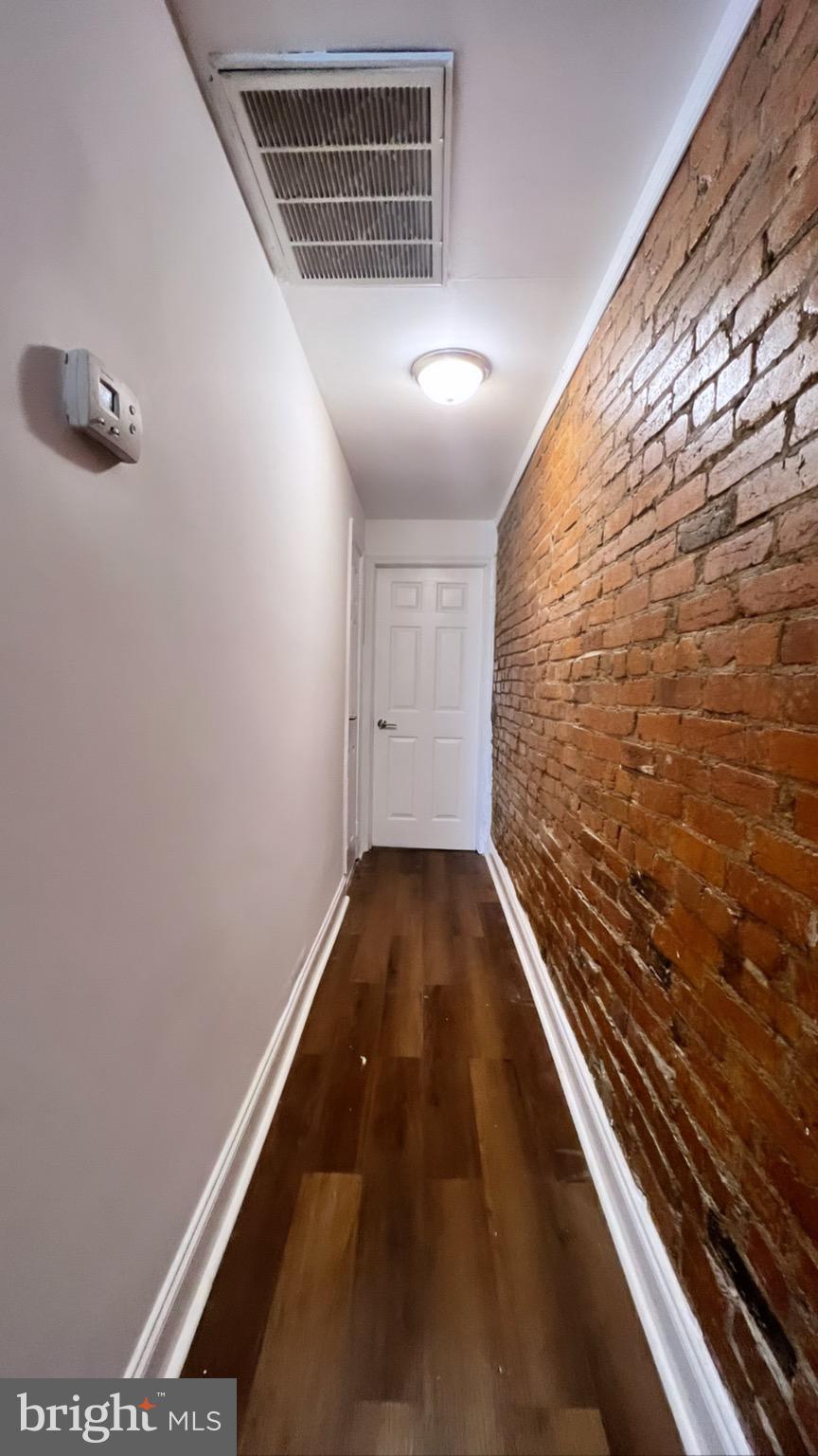 1345 1st Street Northwest, Unit 1 Washington, DC 20001 - Photo 9 of 17 a view of an empty room