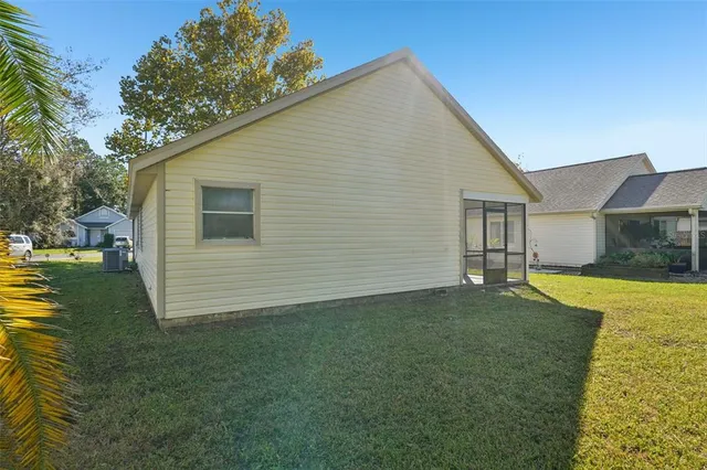 a picture of a room with a white wall and a picture