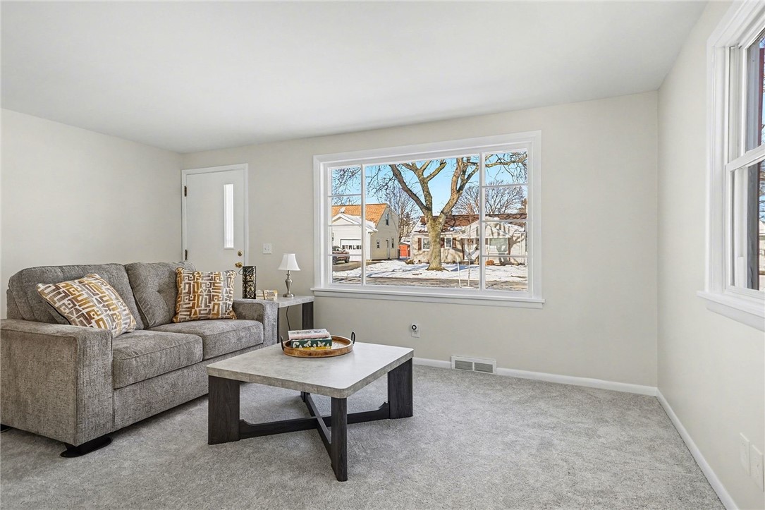 45 Studley Street Rochester, NY 14616 - Photo 4 of 25 Living Room - flooded with natural light and nearl
