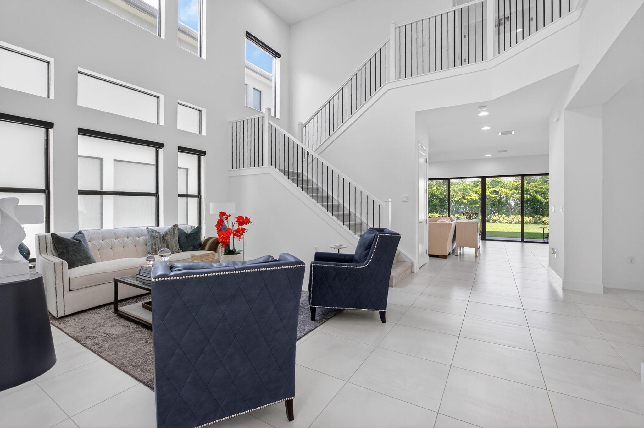 20278 Bandon Dunes Road Boca Raton, FL 33434 - Photo 11 of 113 a living room with furniture and a large window