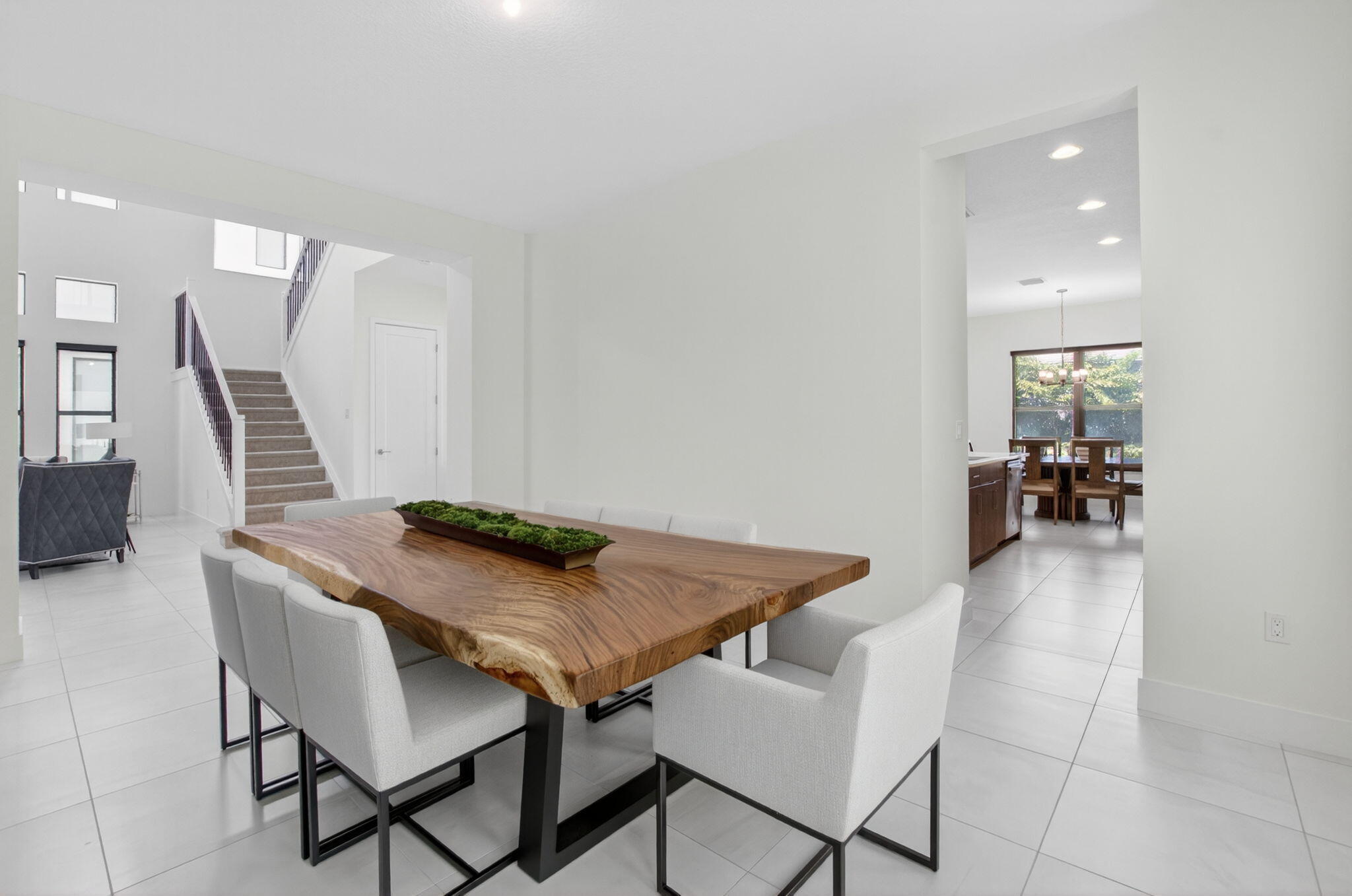 20278 Bandon Dunes Road Boca Raton, FL 33434 - Photo 18 of 113 a view of a dining room with furniture and wooden floor
