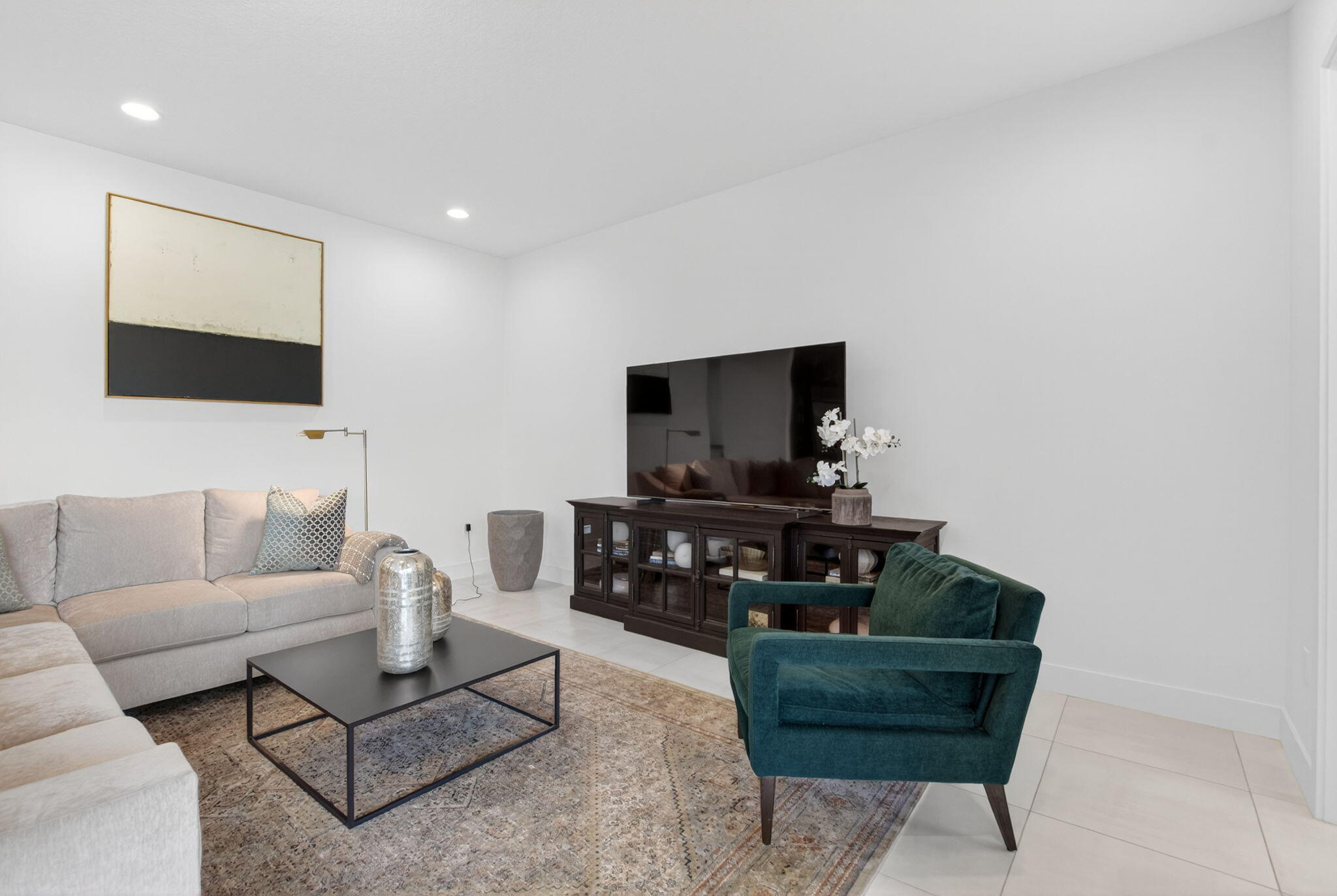 20278 Bandon Dunes Road Boca Raton, FL 33434 - Photo 22 of 113 a living room with furniture a flat screen tv and kitchen view