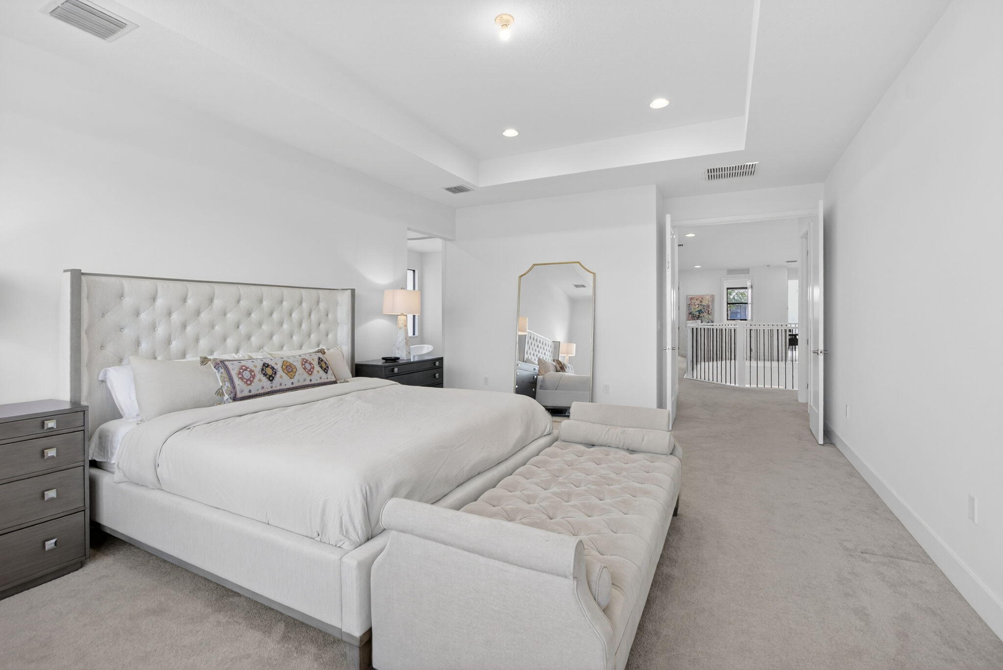 20278 Bandon Dunes Road Boca Raton, FL 33434 - Photo 39 of 113 a bedroom with a large bed and chandelier