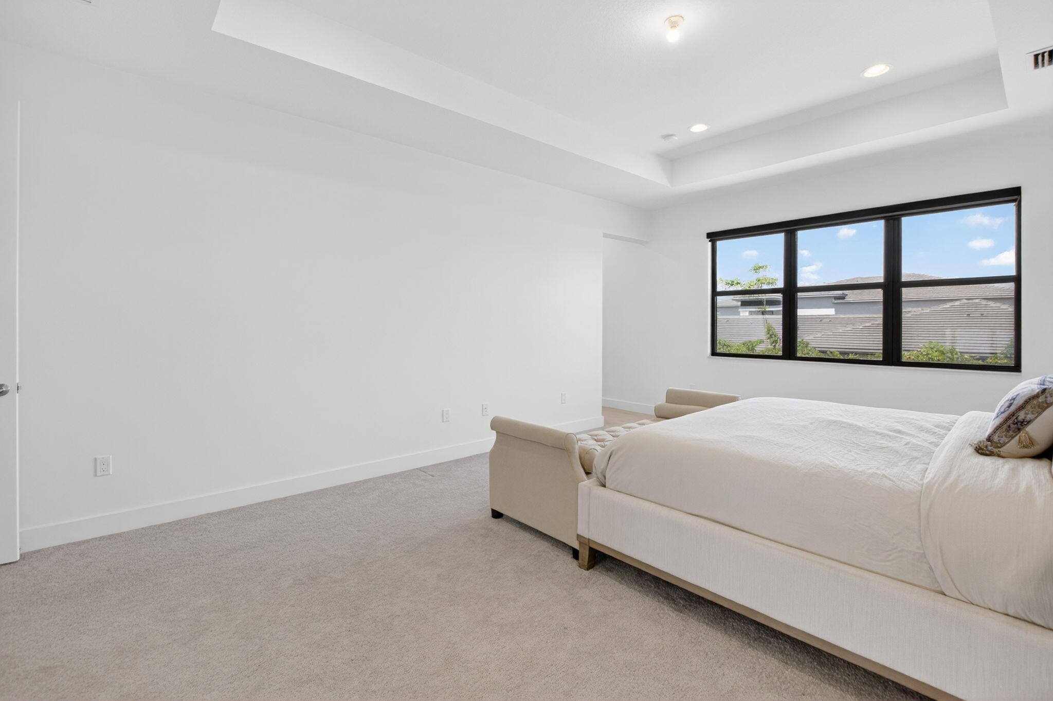 20278 Bandon Dunes Road Boca Raton, FL 33434 - Photo 44 of 113 a bedroom with a bed and a large window