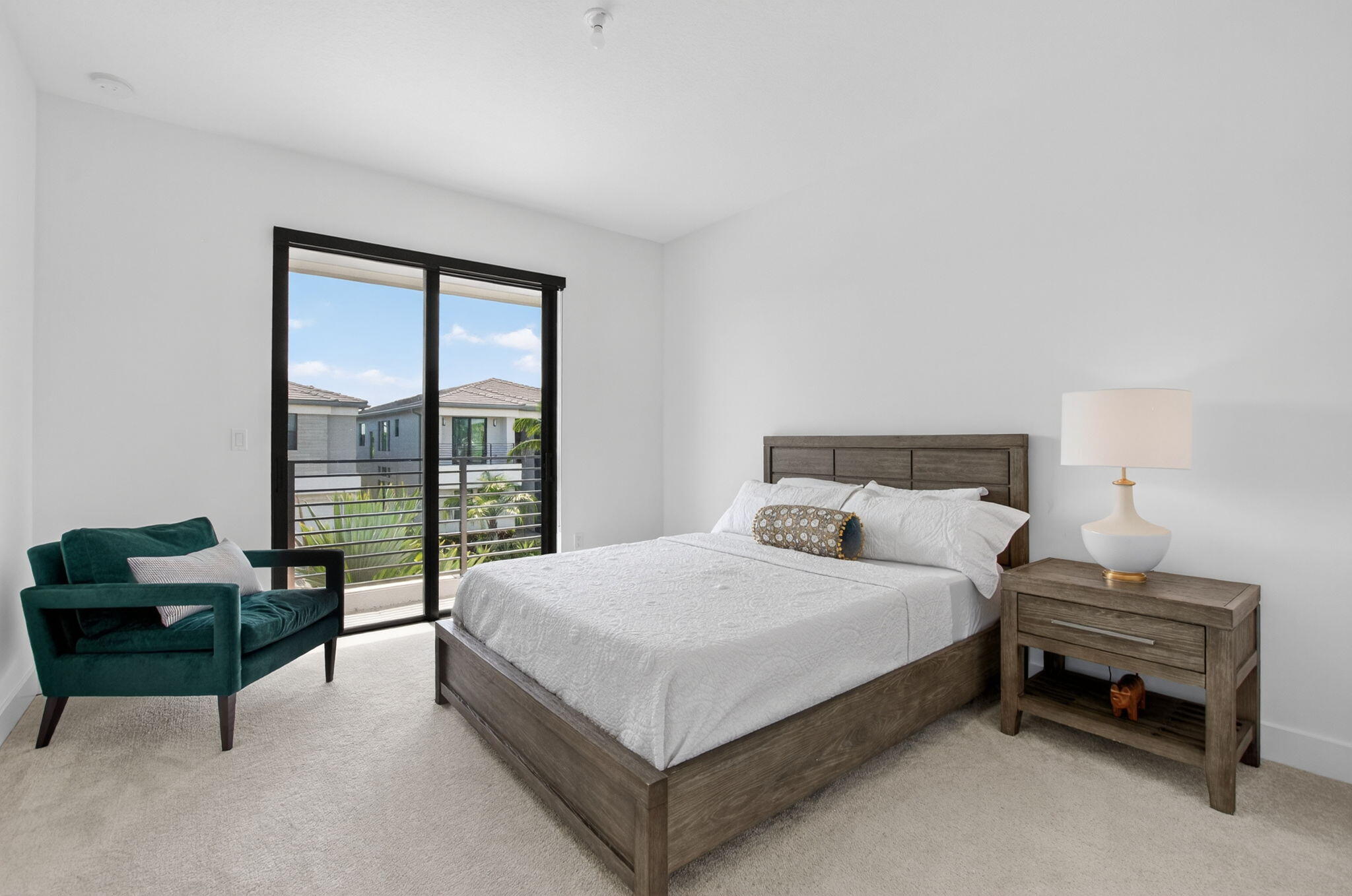 20278 Bandon Dunes Road Boca Raton, FL 33434 - Photo 52 of 113 a bedroom with a bed and a couch next to a window