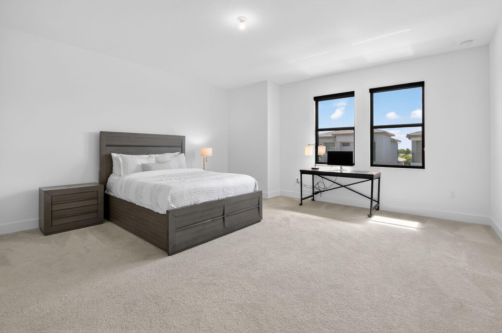 20278 Bandon Dunes Road Boca Raton, FL 33434 - Photo 57 of 113 a bedroom with a bed and a chair