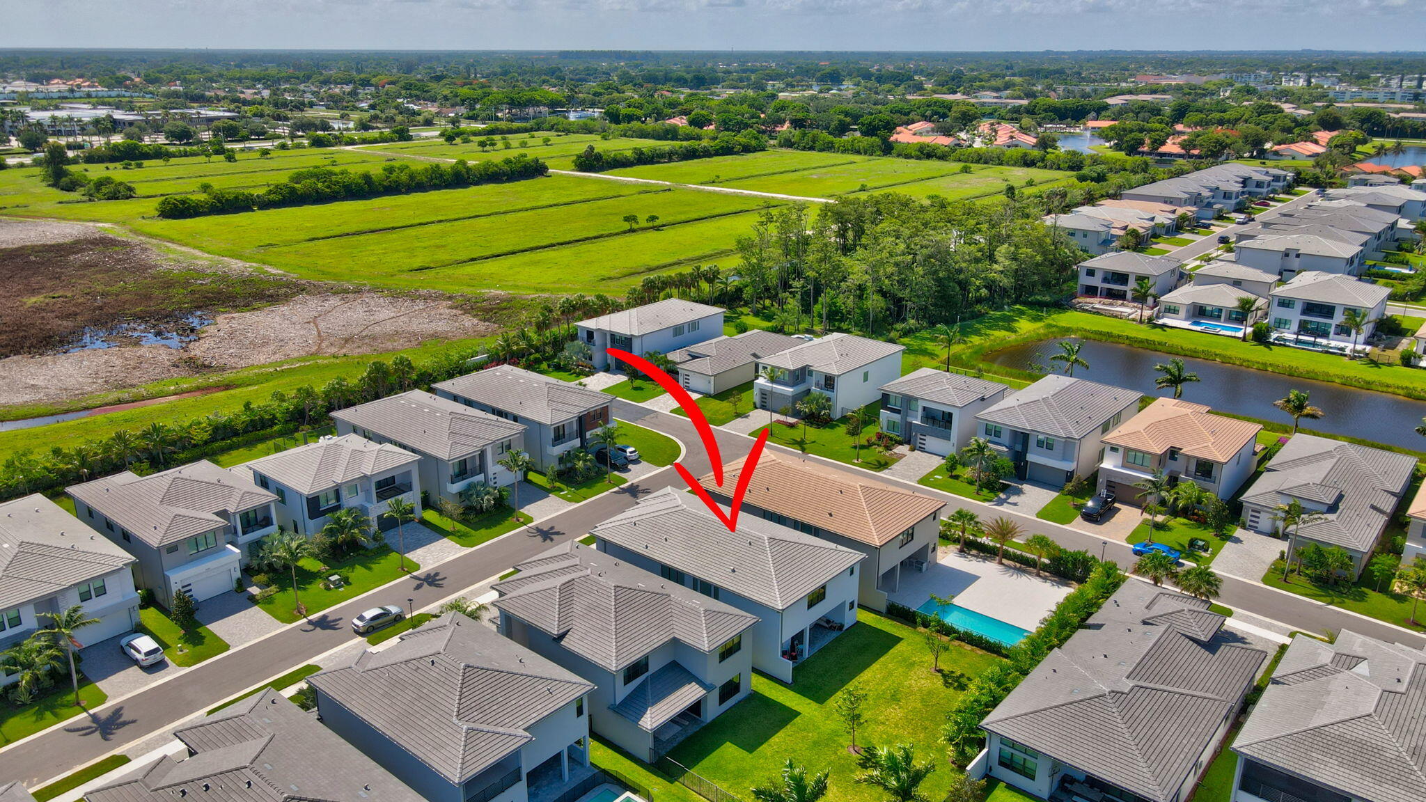 20278 Bandon Dunes Road Boca Raton, FL 33434 - Photo 77 of 113 an aerial view of a houses with a garden and outdoor space