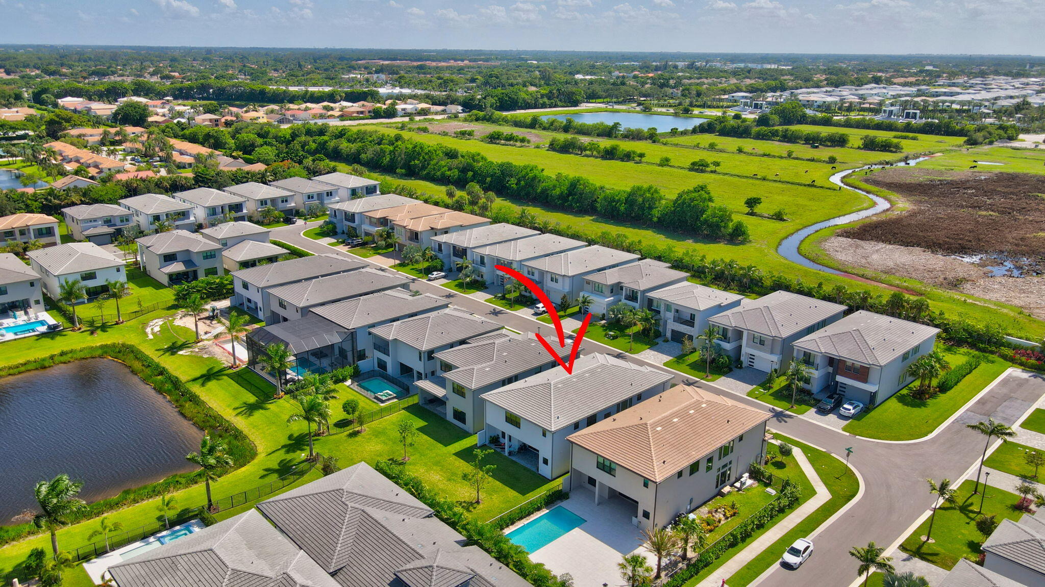 20278 Bandon Dunes Road Boca Raton, FL 33434 - Photo 78 of 113 an aerial view of a house with a swimming pool yard and outdoor seating
