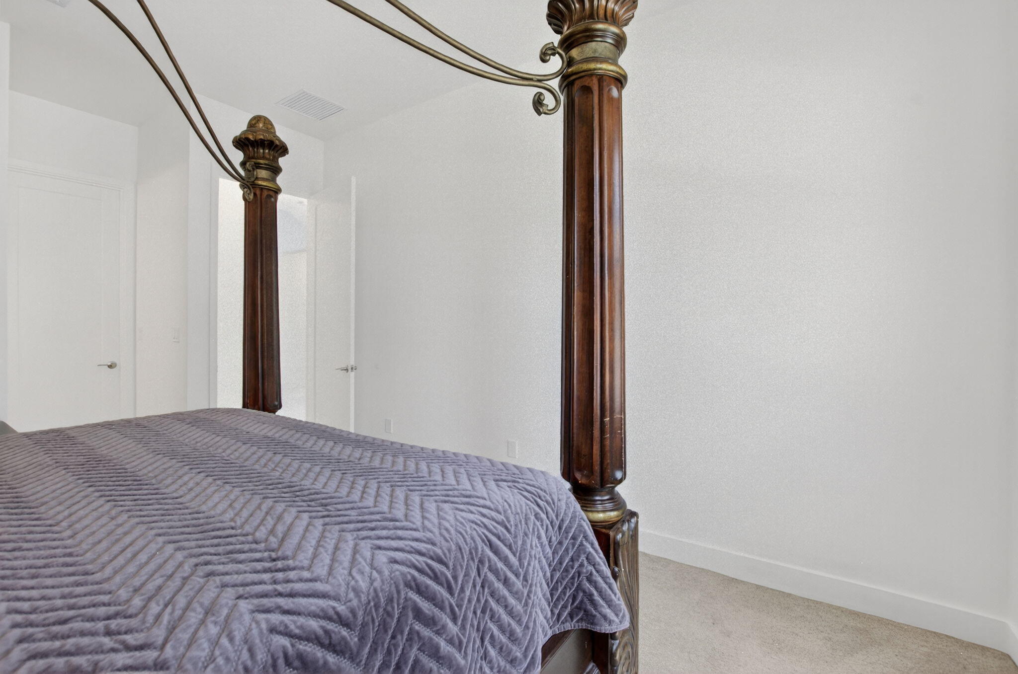 20278 Bandon Dunes Road Boca Raton, FL 33434 - Photo 8 of 113 a bedroom with a bed and a mirror