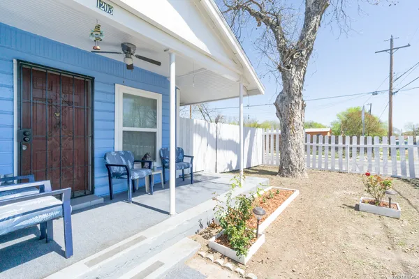 a view of a backyard with a patio