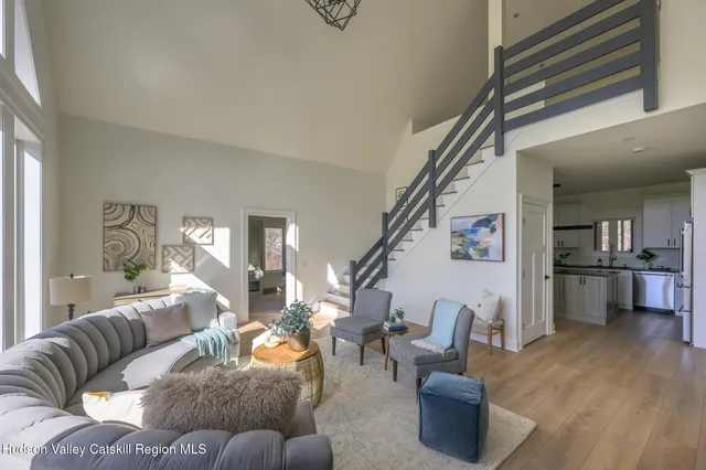 a kitchen with stainless steel appliances granite countertop a stove and cabinets