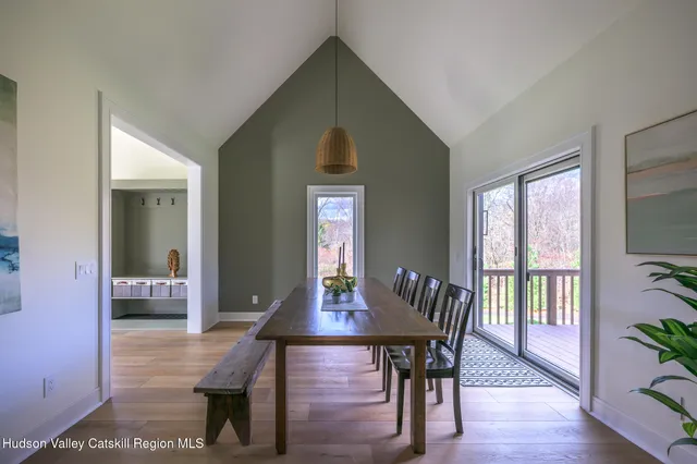 a view of a living room and bathroom