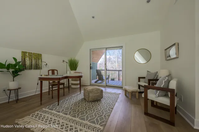 a balcony view with a outdoor seating space