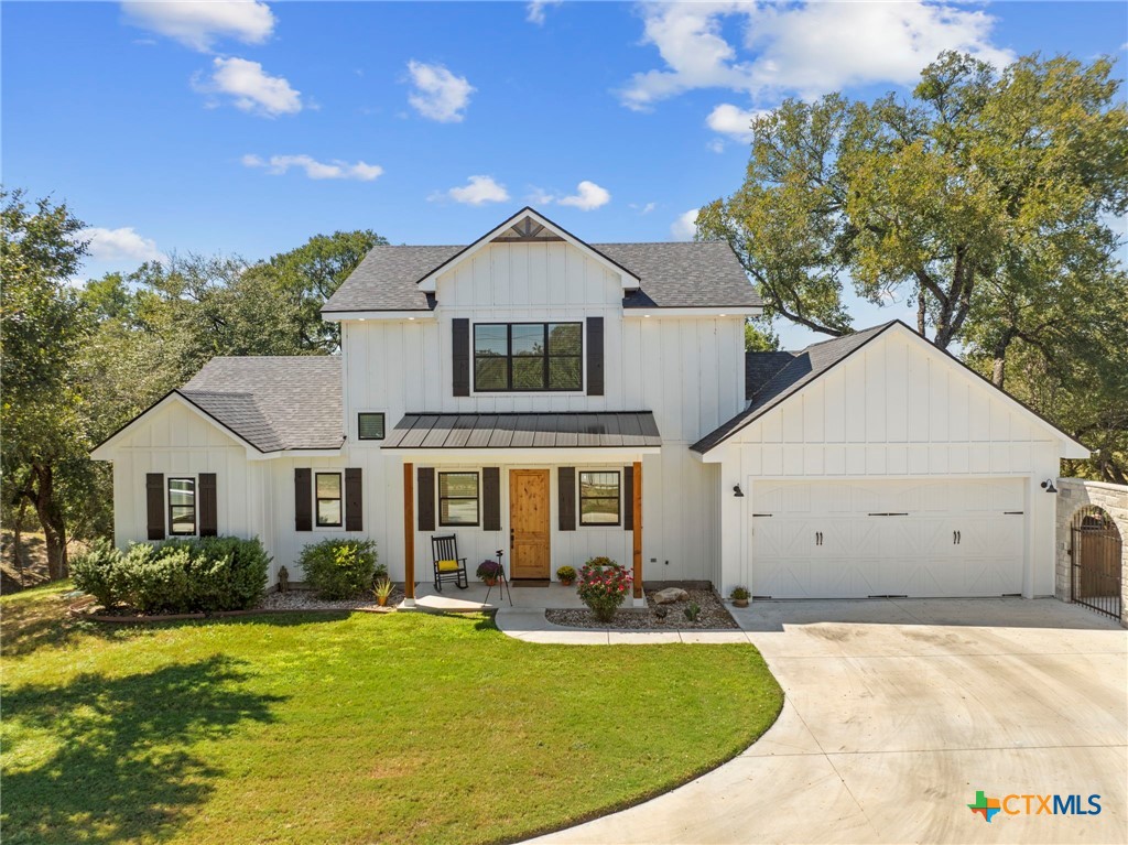 28099 Fm 2670 Killeen, TX 76549 - Photo 47 of 48 a view of a white house with a yard plants and large tree