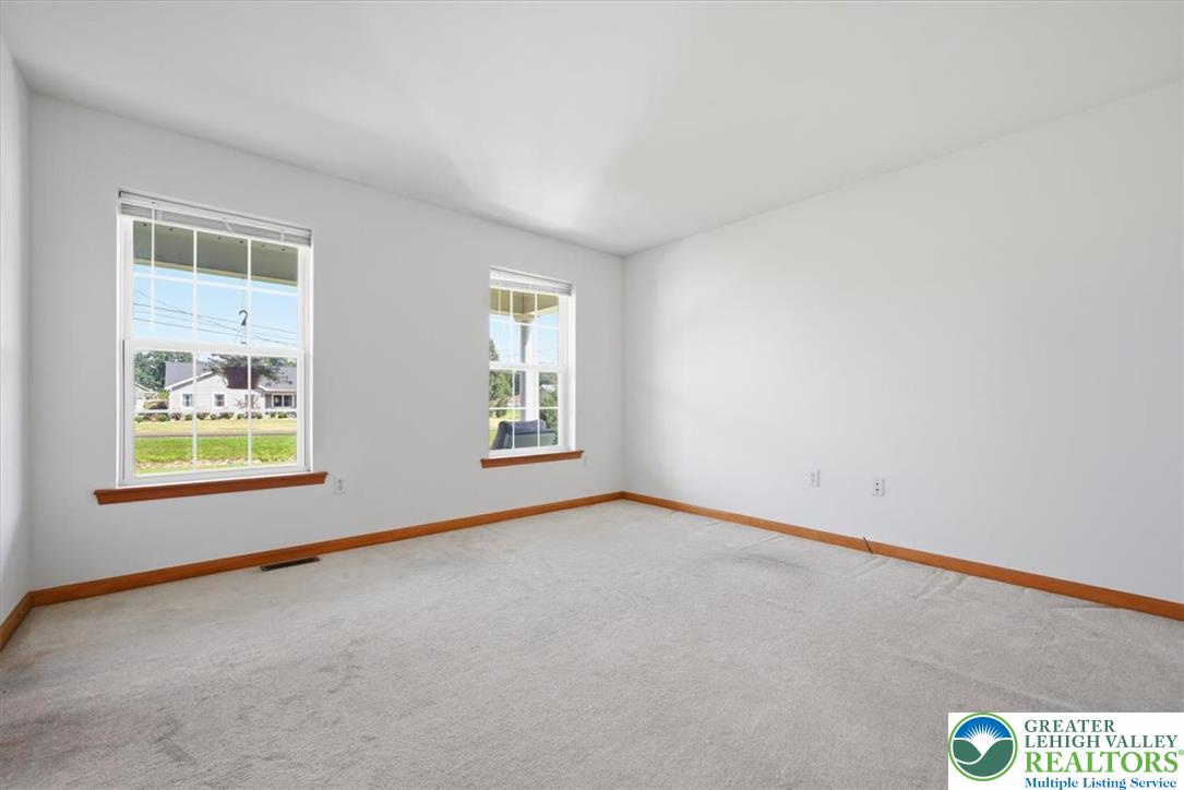 66 Labar Road Bangor, PA 18013 - Photo 39 of 56 A versatile room bathed in natural light, perfect for a primary bedroom or a comfortable family gathering space.