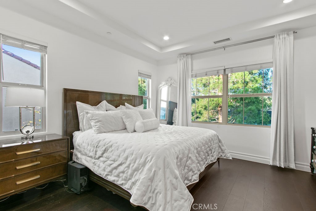 120 Gemstone Irvine, CA 92620 - Photo 14 of 43 a bedroom with a bed and a window