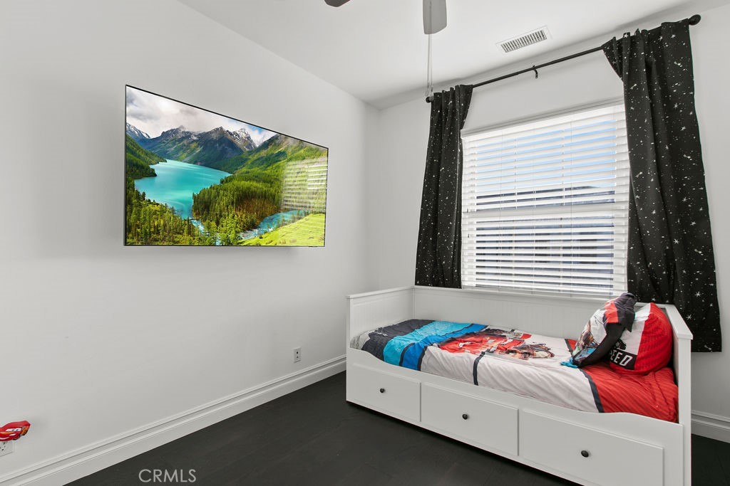 120 Gemstone Irvine, CA 92620 - Photo 19 of 43 a bedroom with a bed and a window